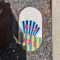 Anonymous account uses art to fill holes and create a rallying cry: ‘Fix ATL’