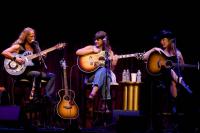 Three talented musicians sing their songs on the Pioneer stage