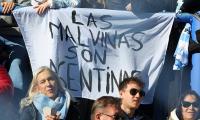 Argentina rugby fans display 'Malvinas' banner laying claim to the Falkland Islands - as bad blood lingers after World Cup semi-final