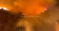 Large wildfire burning near Albania's capital spreads overnight prompting evacuations