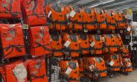 Powering the small boat crisis: The sportswear stores on northern French coast raking in fortune from selling lifejackets to the thousands of migrants headed for UK