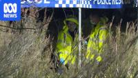 Police working to determine how long body in suitcase lay by road