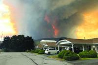 Wildfire forces 20,000 to evacuate in western Canada