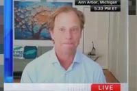 Economist accidentally swallows fly during live CNN interview