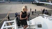 Donald Trump's 'beautiful' blonde aide carries huge bag during their weekend together