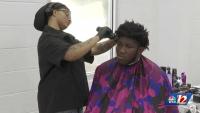 Local salon offers free haircuts and school supplies