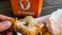 Popeyes Sued For $1.5M After Texas Customers Find ‘Condom-Like’ Object In Chicken