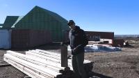 In Kansas, a high-performance home was built from reclaimed steel, lumber, and a wind turbine tower