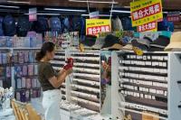 Exports slow slightly in July despite robust demand for high-tech products