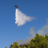 Greece battles new fire driven by winds