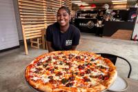 Fishtown’s latest pizzeria celebrates Black culture with pies topped with oxtail and collard greens, jerk chicken, and shrimp and grits