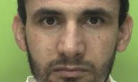Afghan asylum seeker who raped schoolgirl in woods after masquerading as 14-year-old boy on Snapchat is jailed for nearly 10 years