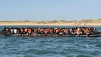 Record 230 migrants reach England on one boat