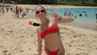 Brittany Mahomes soaks up the sun on family vacation in a red Burberry X Hunza G bikini