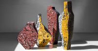 recycled paper composite forms sculptural vessels that evoke volcanic rocks