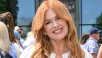 Isla Fisher, 50, looks sensational in plunging black swimsuit during sun-soaked pool day
