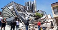 Death toll tops 100 with Colombians buried under rubble by quake