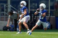 Giants return home for camp in makeshift conditions because of construction