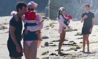 Joshua Kushner brushes off his failed bid to buy a stake in the World Cup after it sparked huge backlash as he enjoys a day at the beach with wife Karlie Kloss and their family in Malibu