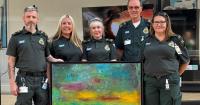Norfolk artist donates painting to raise funds for community's first responders