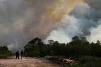 Indonesia races to contain fires as haze spreads