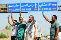 Hundreds of Syria Kurds head back to border town