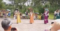 Global travelers explore China's cultural heritage amid cool mountain air