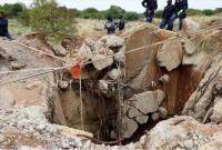 ILLEGAL MINERS DIE IN MINE COLLAPSE