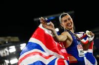 British sprinter Hunt chasing three more golds after winning 100m