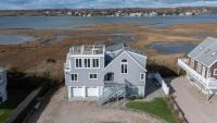 Home of the Week: Rhode Island beach house with water views on both sides for under $2m