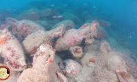 Bottoms up: vast Roman shipwreck filled with ancient wine amphoras discovered near Sicily