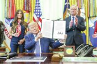 Trump signs executive order calling for fewer childhood vaccines