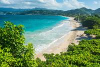 Forget Jamaica, Visit This Underrated Spice Island With Hidden Coves, World-Class Snorkeling, And Crowd-Free Sands