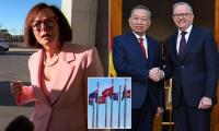 Nationals MP questions why Chinese flags are flying over Parliament House in Canberra - only to be told she had the wrong country