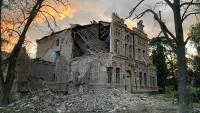 Russians bomb historic school; Ukrainians, under fire, keep the faith