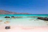 This Beach Was Named No. 1 in Europe—and It Has Pink Sand, Crystal-clear Turquoise Water, and a Lagoon You Can Walk Through