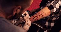 This tattoo startup is paying artists royalties and attracting brands
