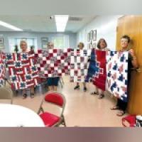 Quilt Guild makes donations to Mid-Michigan Honor Flight