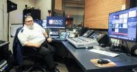 Oscar works computers for Kroc and Dietert centers