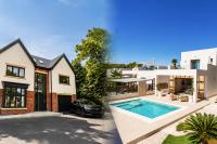 Win two homes, two cars and £50,000 in this 19p competition