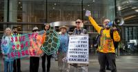 Protesters accuse insurance industry of hiring ‘corporate spies’