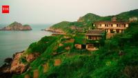 Inside China’s haunting ghost town Houtouwan: The fishing village once home to 2,000 people now lies eerily silent beneath a blanket of greenery