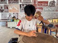 Young Artisans Carry Cambodia’s Traditional Leather Carving Forward