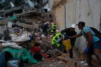Colombian crews search for earthquake survivors