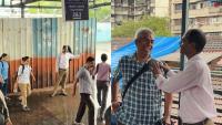 Mumbai Indians Salutes 'Human Indicator' Narendra Patil Who Helps Commuters At Railway Stations | VIDEO