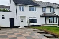 Step inside this three-bedroom Lancaster home with open views and large driveway for £230,000