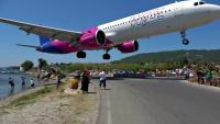 Tourist, 52, suffers traumatic head injury after being blasted off her feet by jet engine at famous plane-spotting beach