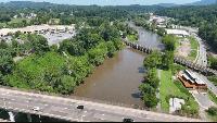 I-26 Connector bridge construction will narrow French Broad River for tubers, kayakers Construction on the Asheville I-26 Connector is moving into the French Broad River, and the NCDOT is advising people who use the river to prepare for changes.