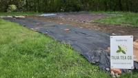In Vermont, neighbors say city-owned flood buyout lot became a farm without their input