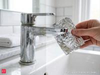 Tap cleaning aluminium foil hack:  How to use aluminium foil to remoave stubborn tap stains without chemicals